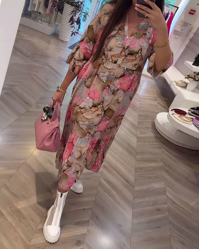 Vestido holgado con suave estampado y escote en V